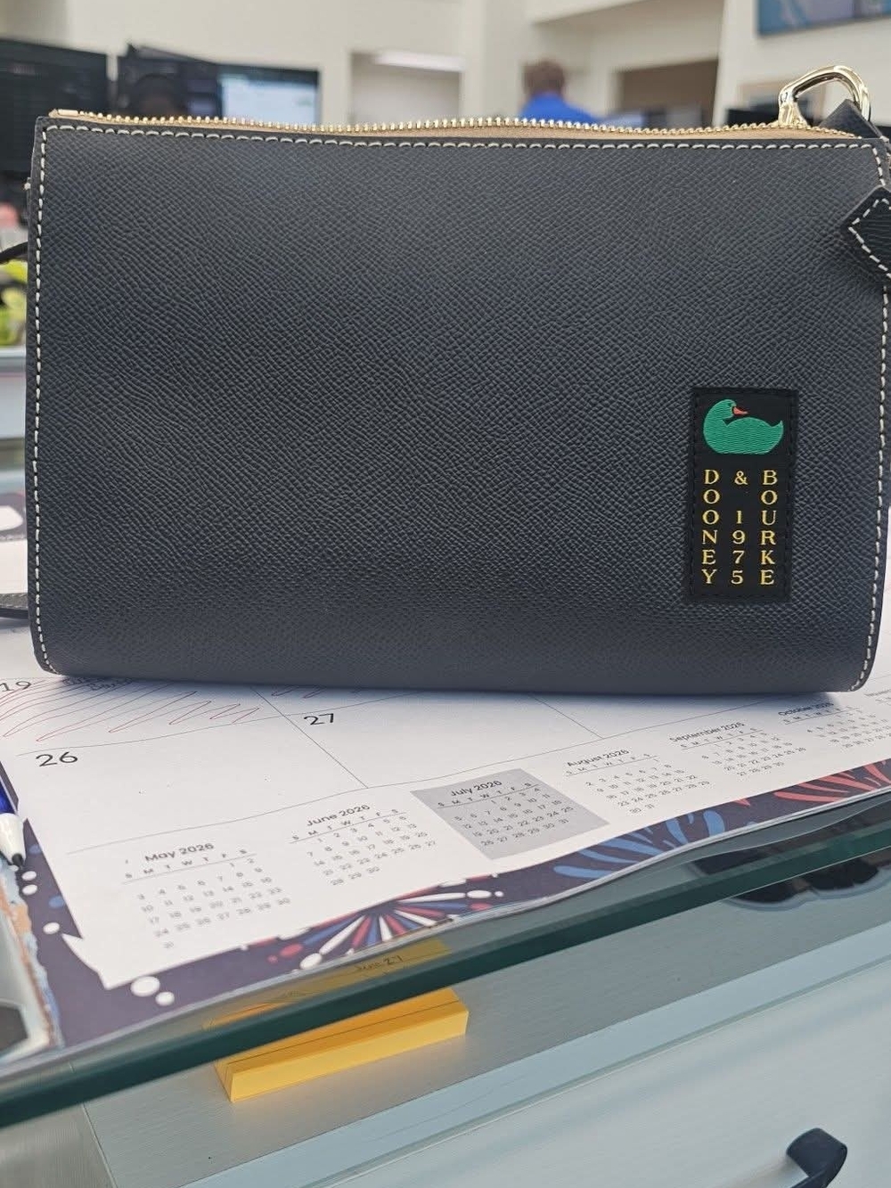 Dooney & Bourke Black Crossbody Duck Logo